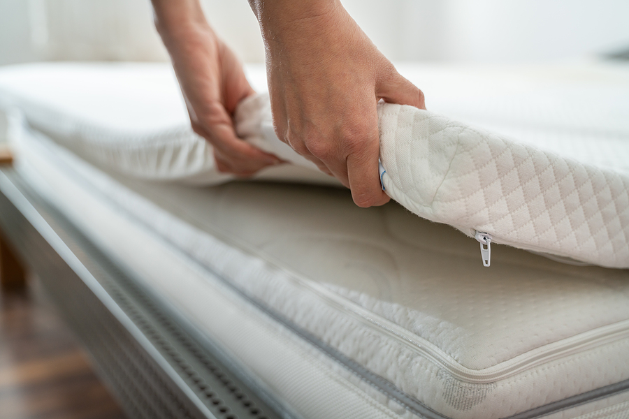 do you wash mattress protectors before use